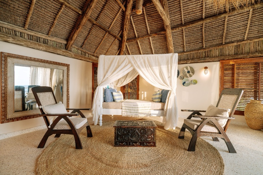 Beach Retreat Villa suite under a thatched roof